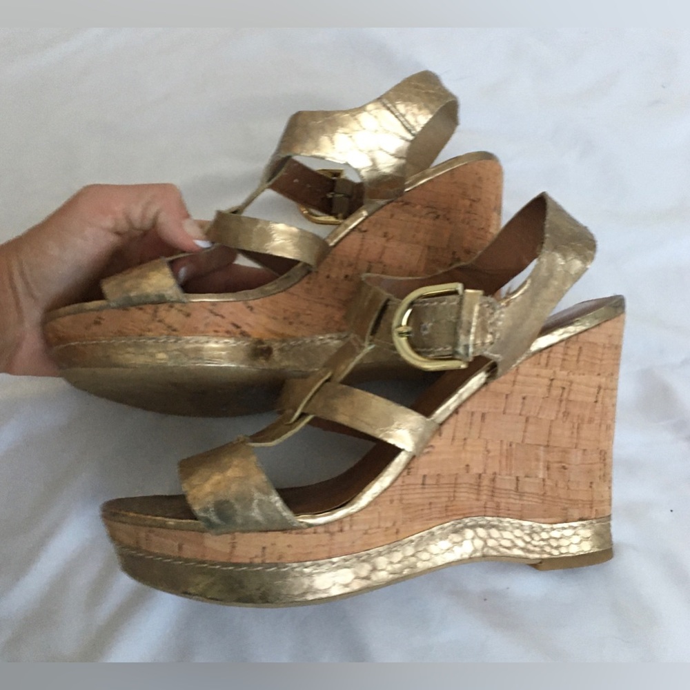 Gorgeous Franco Sarto gold strappy cork platform wedges.